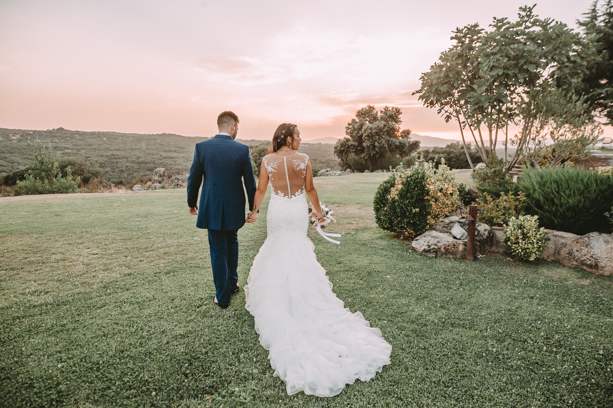 Couple Holding Hands While Walking Together